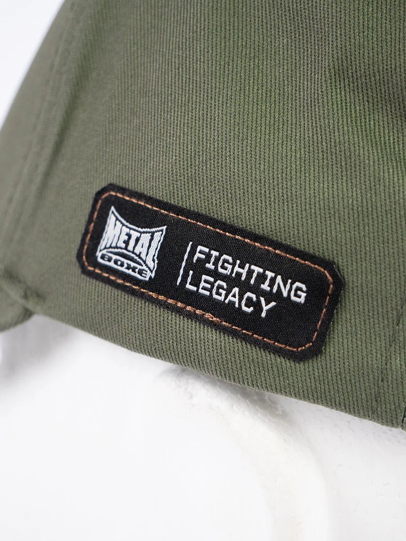 Detail des verstellbaren hinteren Verschlusses der grünen Metal Boxing Cap