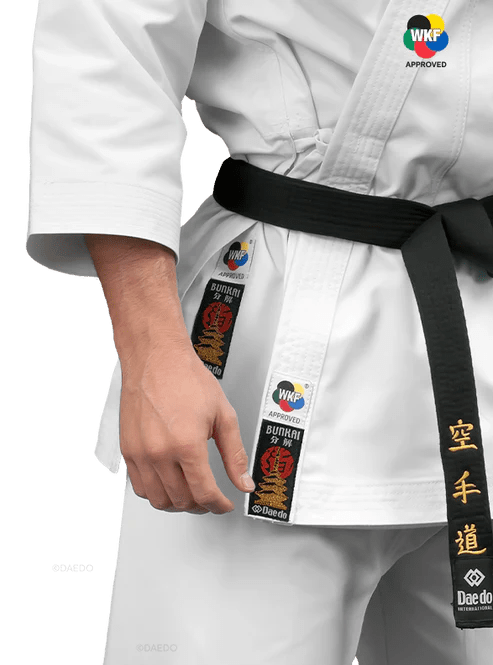 Detail of WKF Approved approval label and Daedo logo embroidered on karate gi.