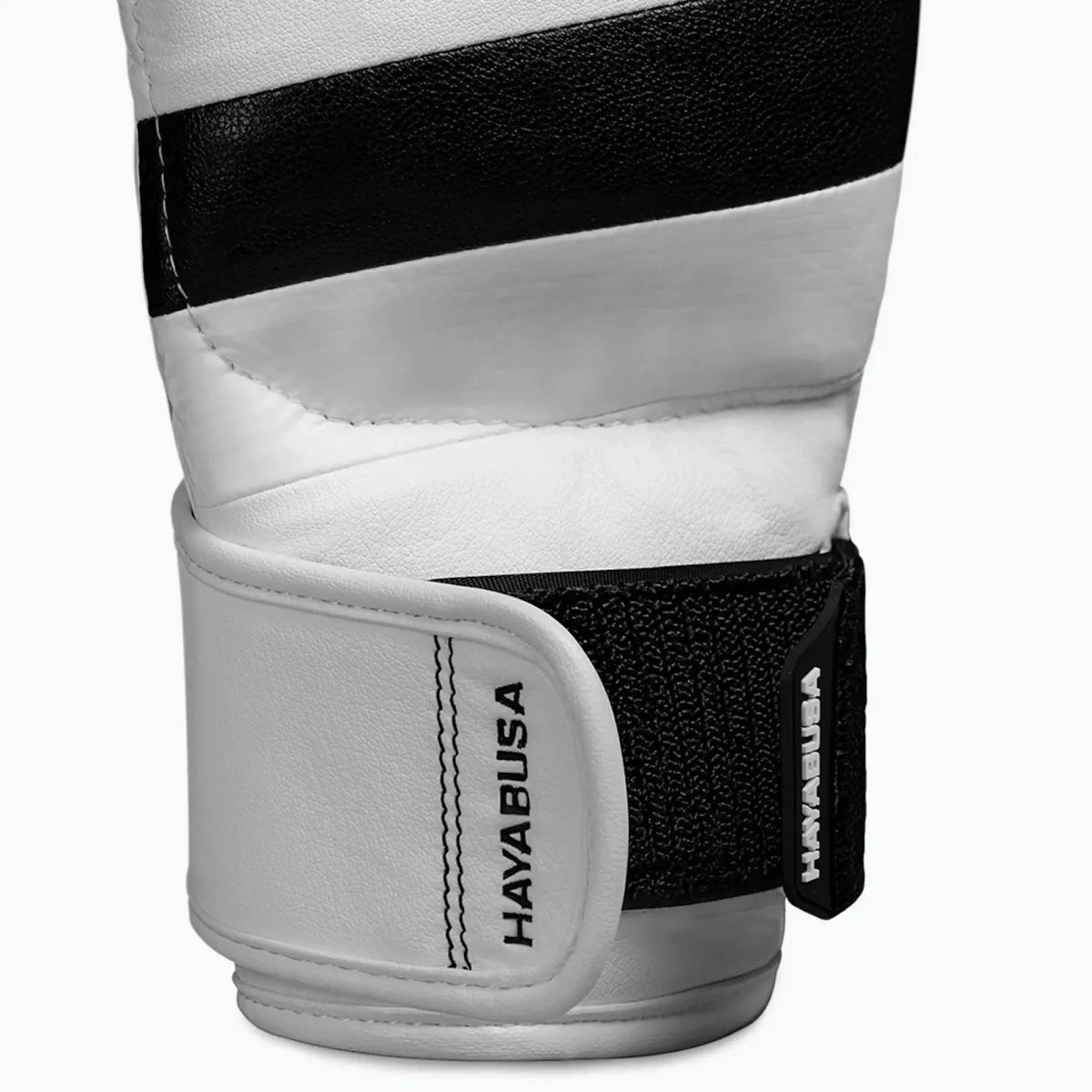 Premium finishes and technical materials of the Hayabusa T3 Hybrid white gloves with contrasting logo.