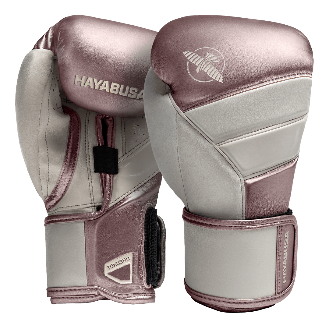 Paio di guantoni Hayabusa T3 rosa metallizzato con inserti oro.