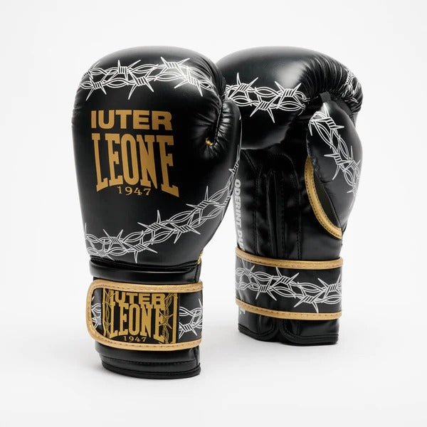 Pair of LEONE x IUTER Barbed Wire boxing gloves in black and gold with barbed wire graphics