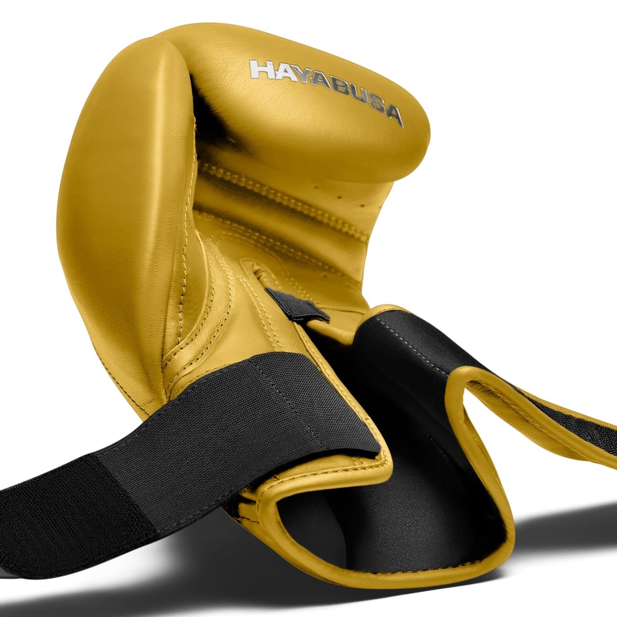 Détail interne de la fermeture ouverte des gants Kanpeki jaunes