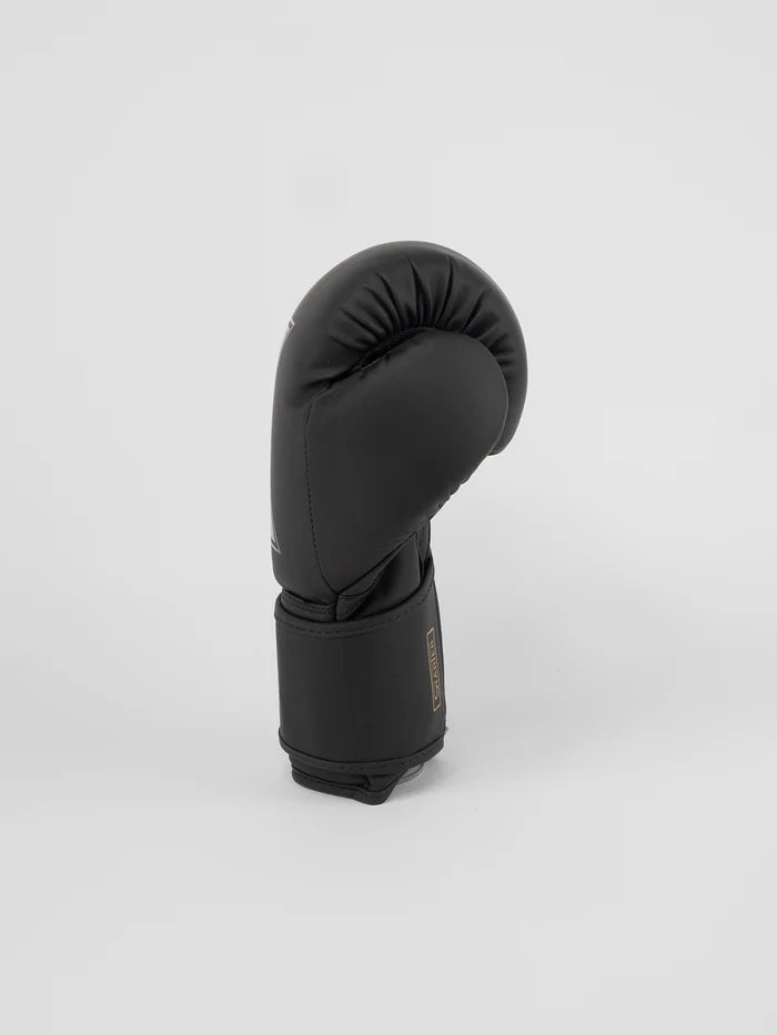 Vue latérale des gants Metal Boxing Starter, noirs et dorés, fermeture velcro sécurisée