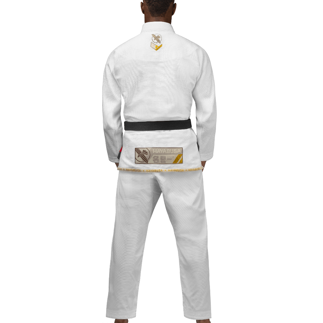 Rear view of the white Hayabusa Ascend Gi showing the pearl weave texture and athletic cut