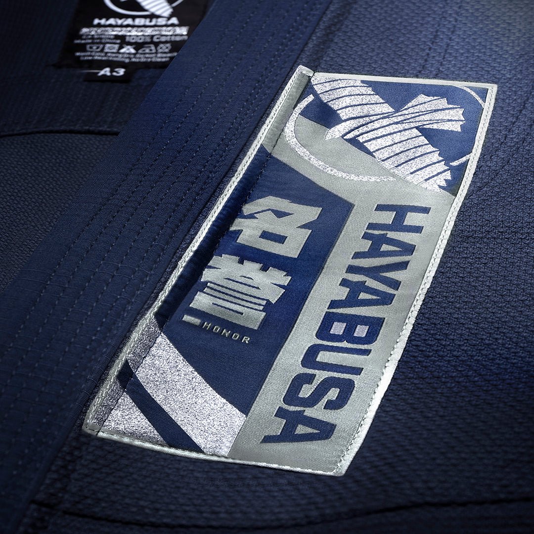 Close-up of the Hayabusa writing and embroidered details on the navy blue variant