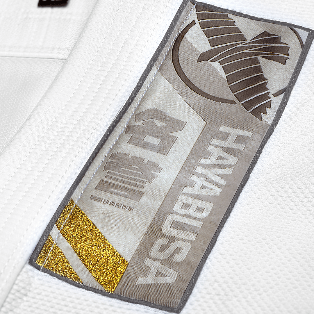Detail of the patches with kanji and embroidery on the white Hayabusa kimono