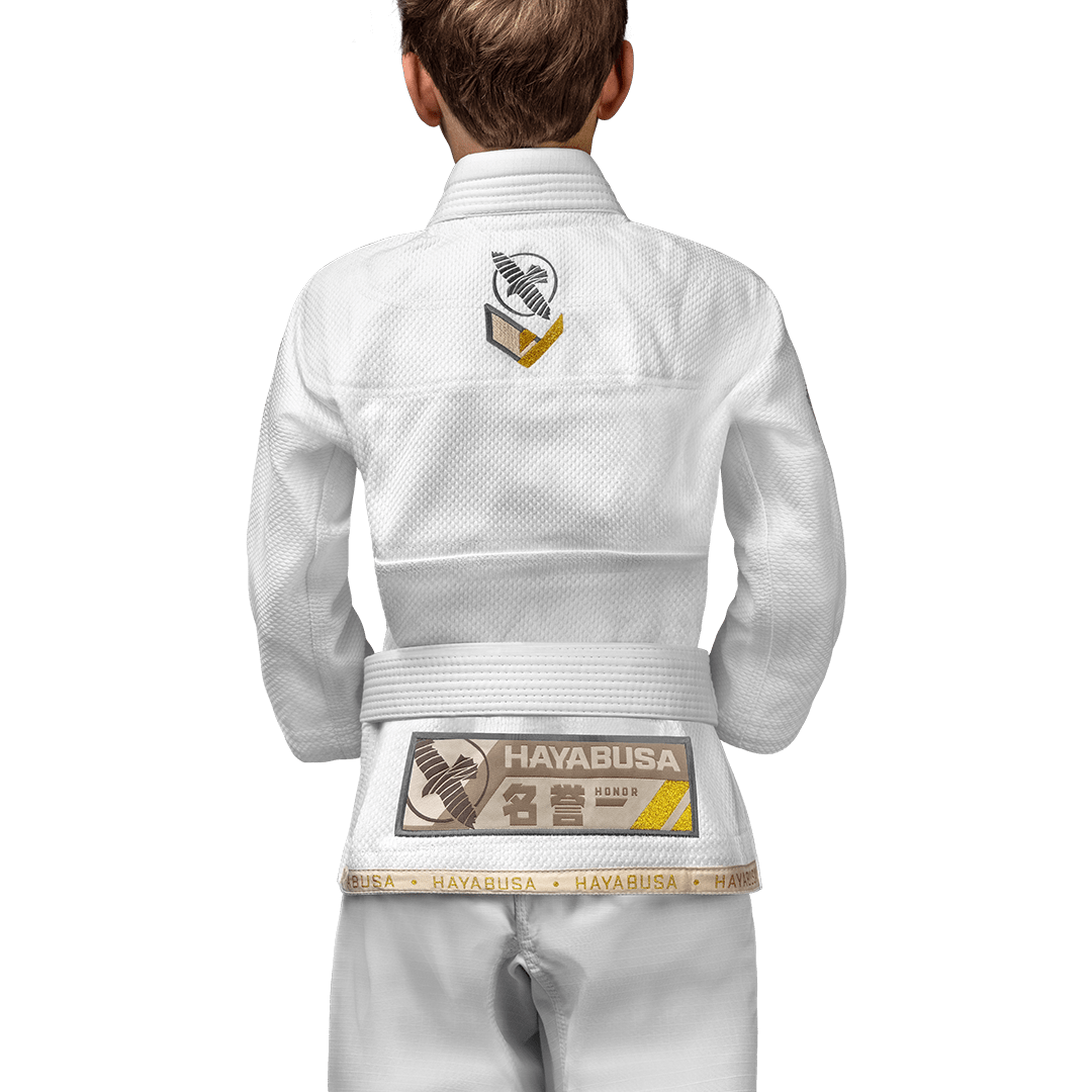 Rear view of the white Hayabusa Ascend Gi showing the ergonomic fit for kids