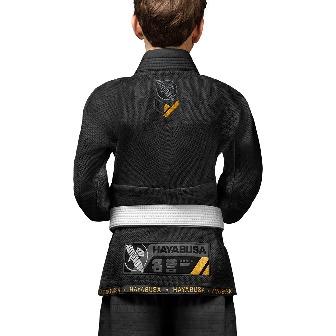 Rear view of the Hayabusa black Gi for children, resistant gold weave fabric