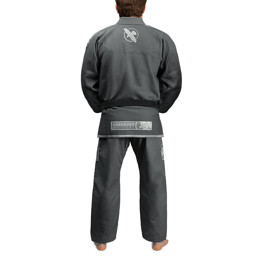 Rear view of the gray Hayabusa Gi showing the construction of the jacket and pants