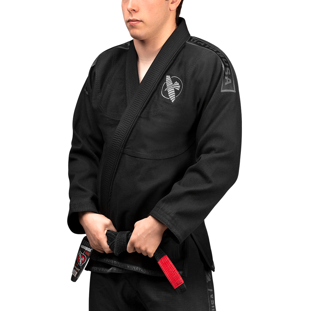Front view of the black BJJ Hayabusa Lightweight kimono with contrasting white embroidery