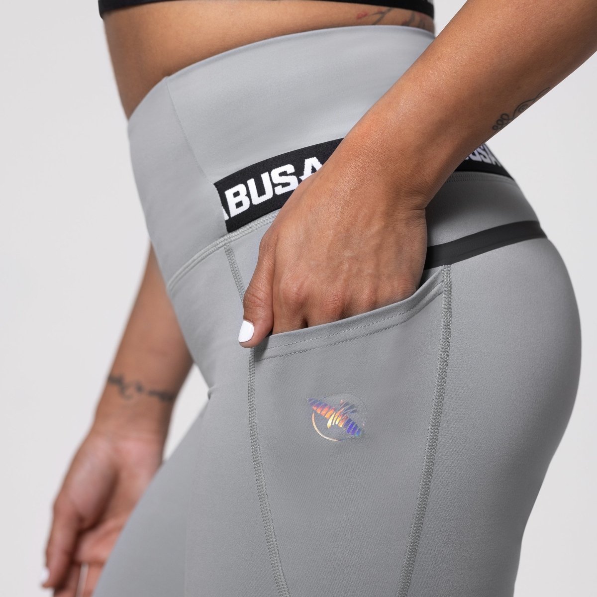 Detail of the practical side smartphone pocket on the gray Hayabusa leggings