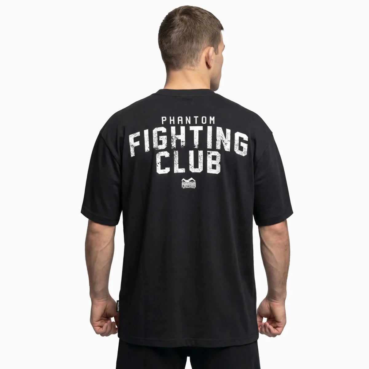 Vista trasera de la camiseta Phantom negra de gran tamaño con el gran gráfico Fighting Club en la espalda
