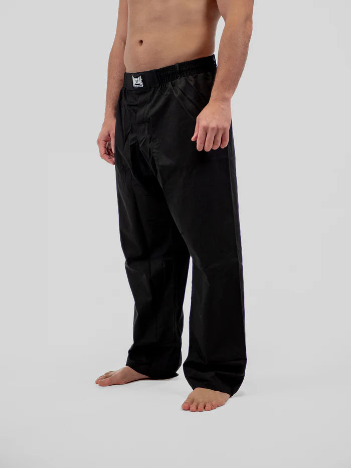 Dettaglio frontale pantaloni Krav Maga Metal Boxe neri focus su trama ripstop anti-strappo