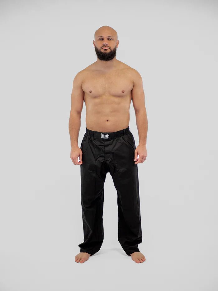 Main front view black Krav Maga Metal Boxing pants worn self defense technique pose