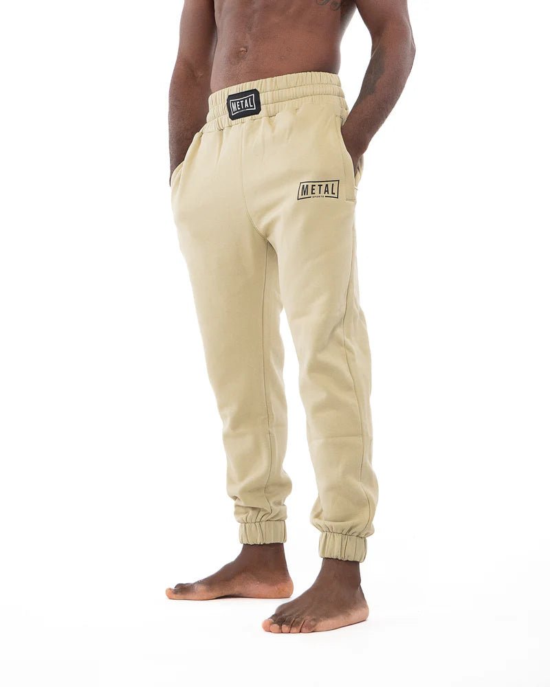 Vista frontal pantalones deportivos desgastados Metal Boxe beige Desert Storm en mezcla de algodón pesado