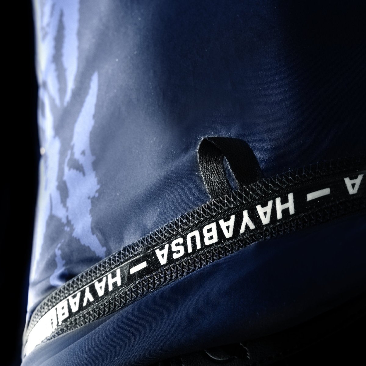 Detail of the Lockdown Loop on the blue Hayabusa rash guard