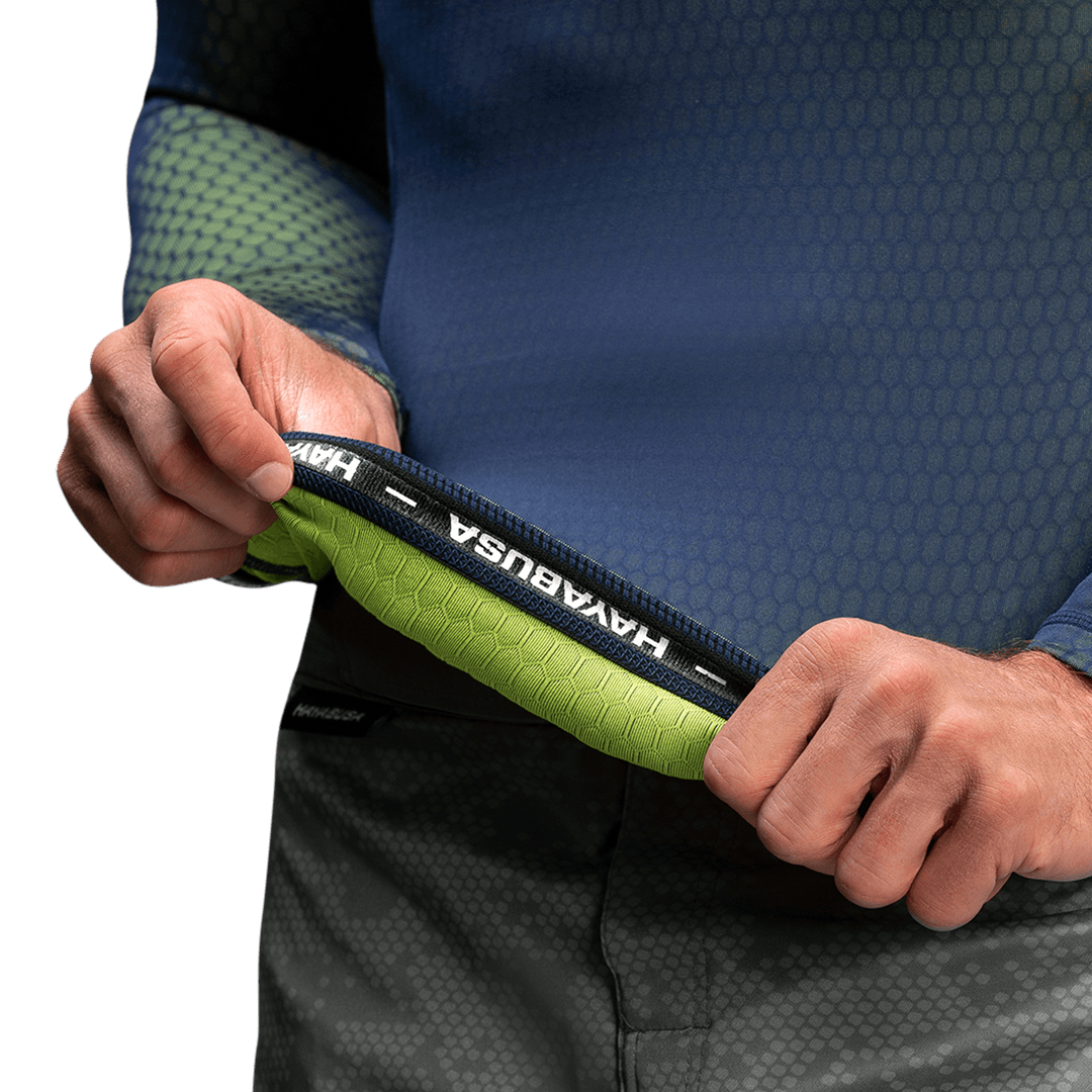 Internal detail of the blue/green Hayabusa Fusion rash guard, showing the non-slip silicone grip