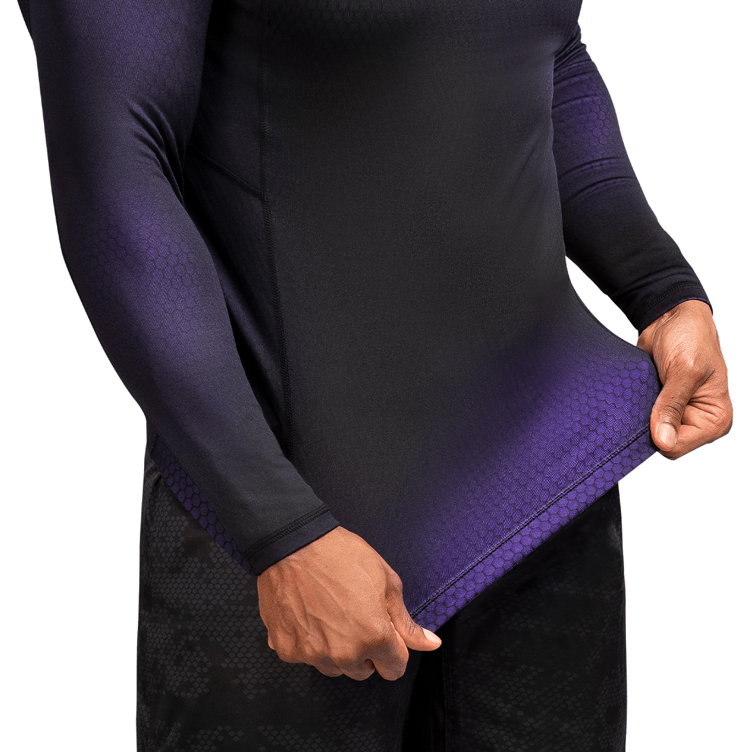 Detail of the interior of the black/purple Hayabusa Fusion rash guard, focus on the quality of the stretch fabric