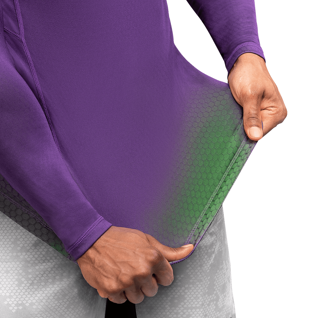 View of the inside of the purple/green Hayabusa Fusion rash guard, detail of the reinforced flatlock stitching