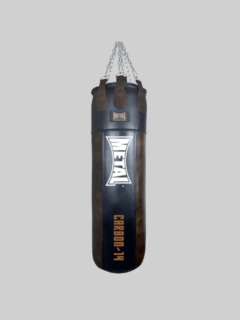 Front view of vintage Metal Boxe Monster Carbon 14 black and brown buffalo leather punching bag