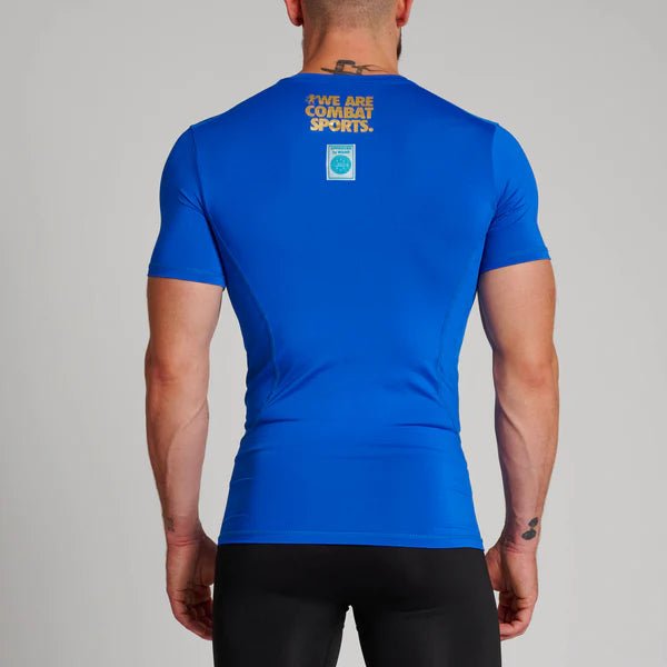 Vista trasera de la camiseta técnica azul Leone que muestra el ajuste ceñido.