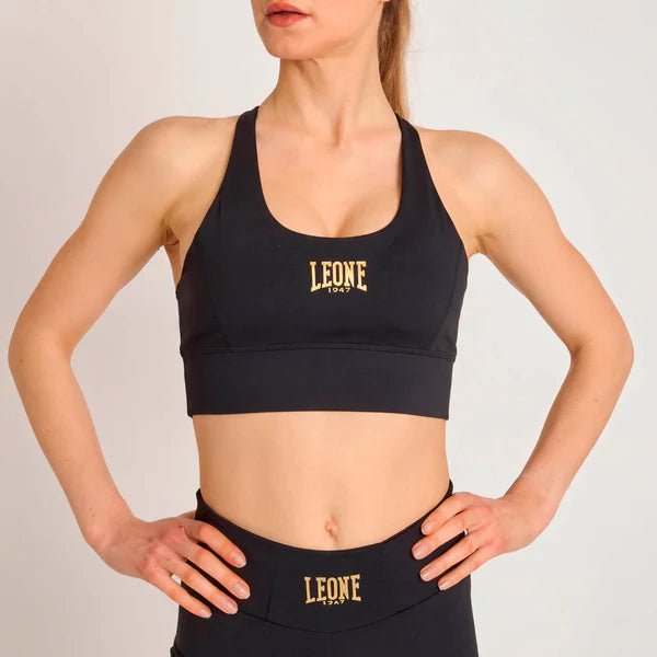 Vorderansicht des schwarzen Leone DNA Sporttops mit kompressiver Passform