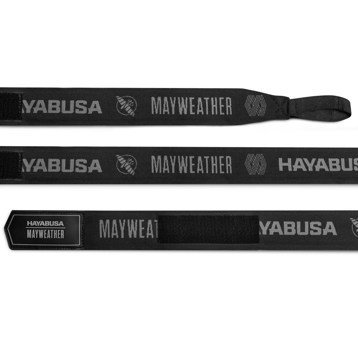 Vendas de boxeo Mayweather Deluxe negras y grises desenrolladas para resaltar el acabado de los materiales.