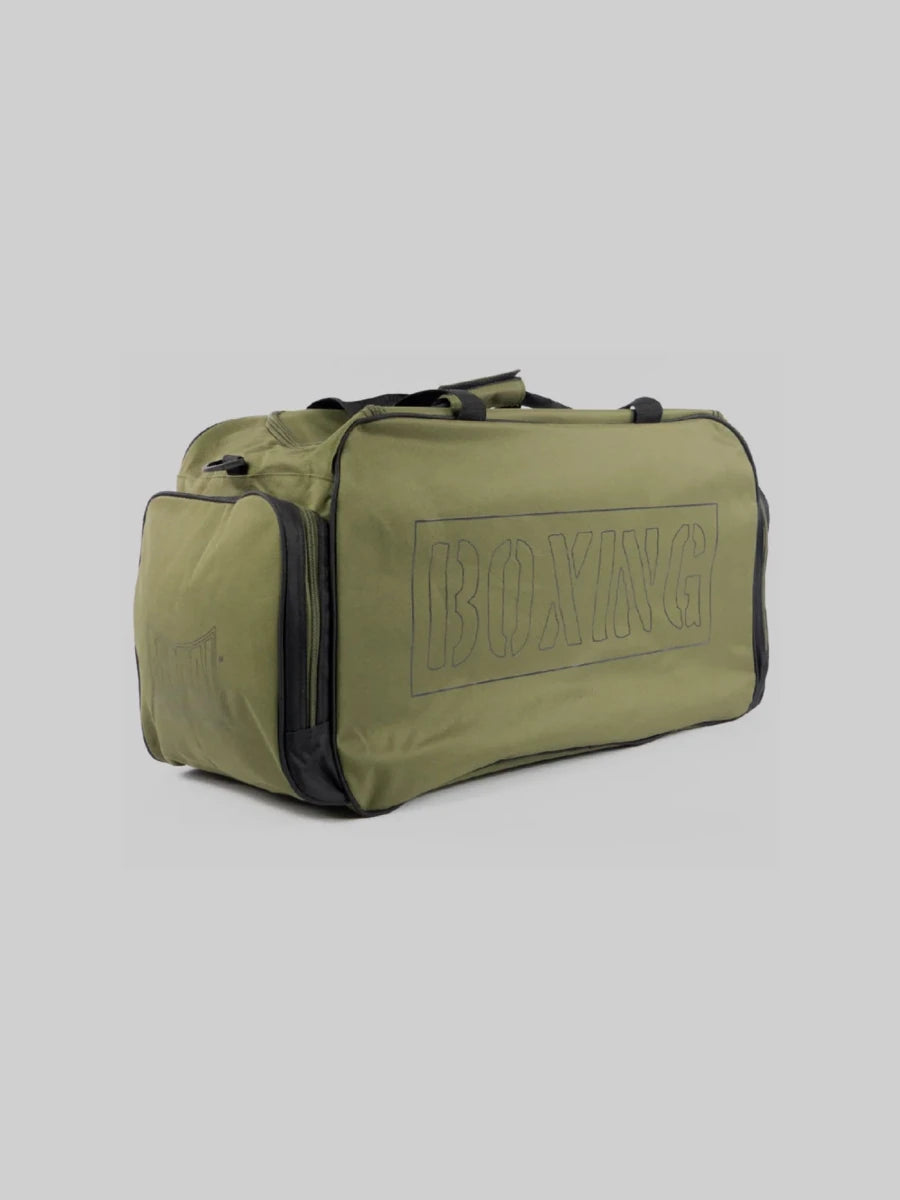 Seitenansicht der Metal Boxe Club-Tasche mit Detail der Zubehörtaschen