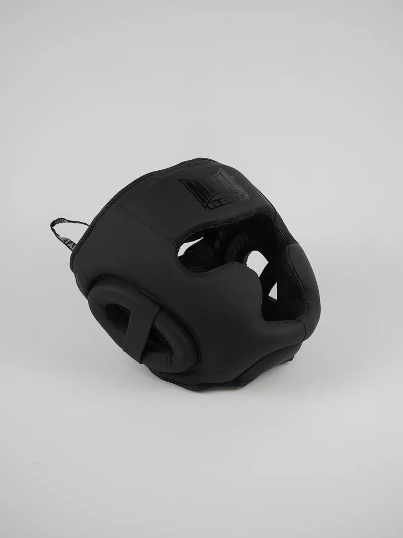 Vista frontale del caschetto Metal Boxe Full Face "Black Light" nero opaco con parazigomi e paramento integrato