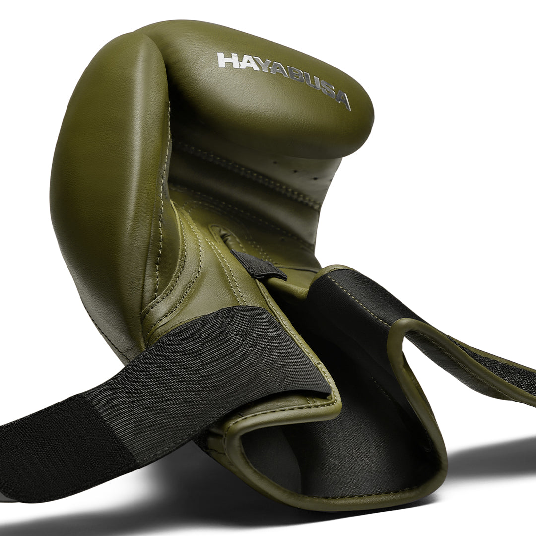 Dettaglio tecnico della chiusura Dual-X slacciata variante verde oliva