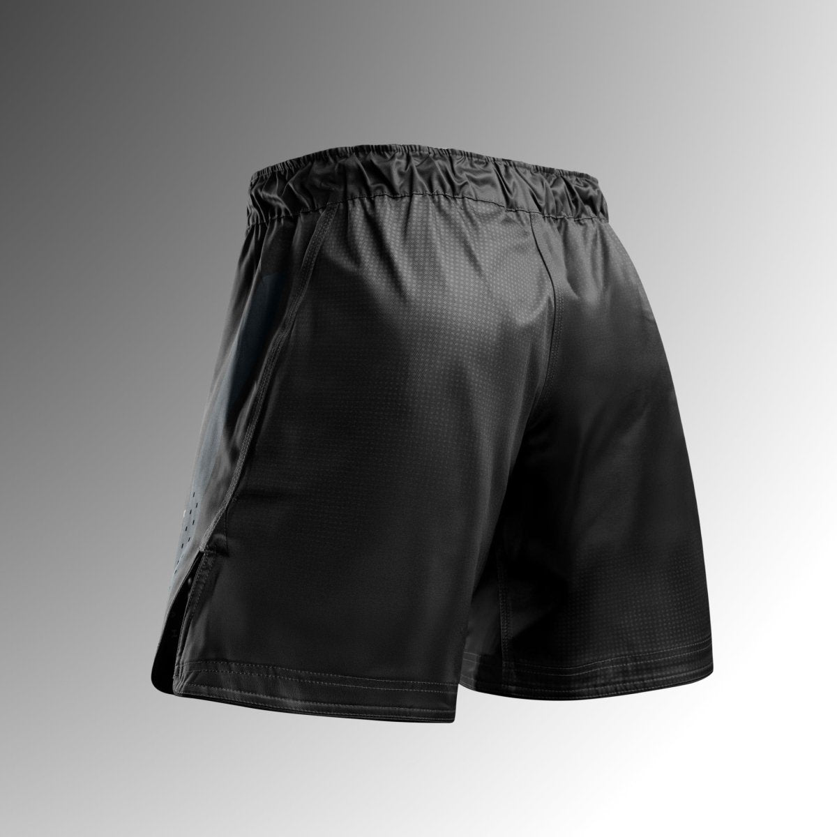 Rear view of the black Hayabusa Core Mid-Thigh MMA shorts in tear-resistant fabric for No-Gi
