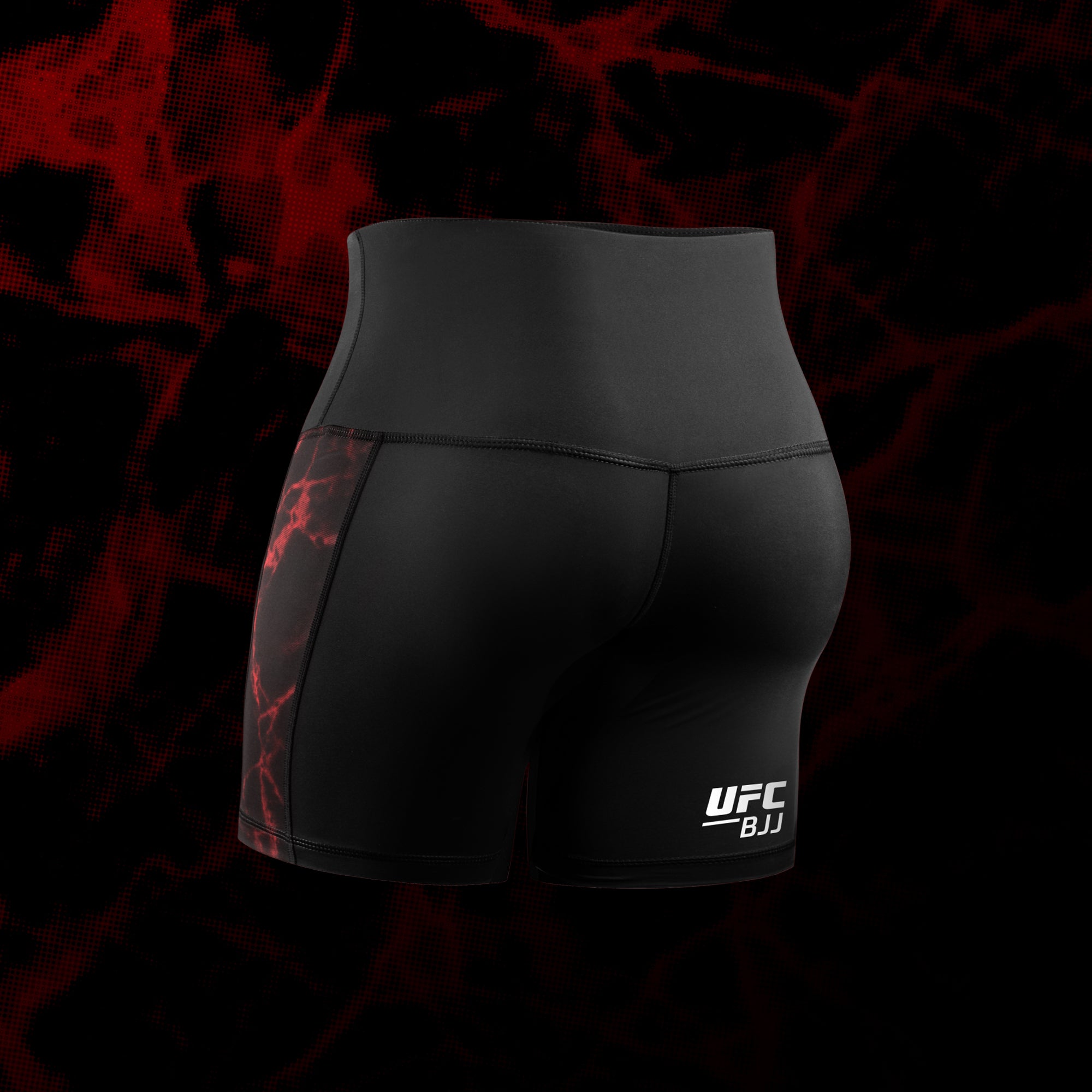 Vista posteriore dei pantaloncini Vale Tudo donna UFC neri e rossi, taglio a compressione