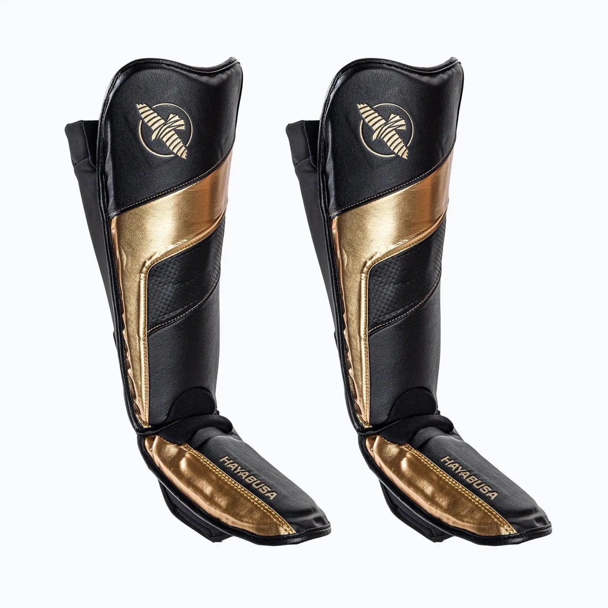 Espinillera Hayabusa T3 Full Back negro oro, edición especial para Muay Thai y Kickboxing.