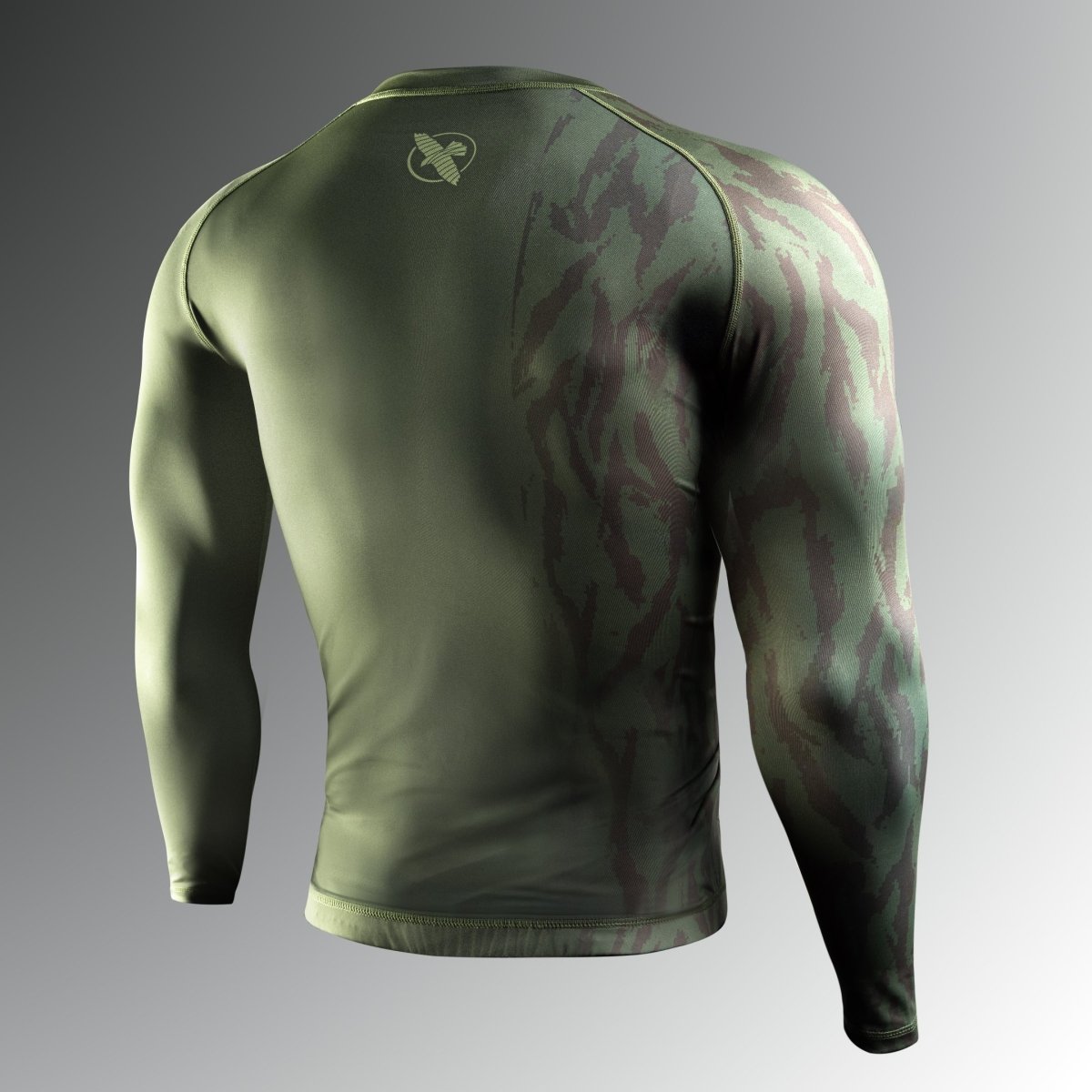 Rear view of the green Hayabusa Apex rash guard with reinforced finishing for rolling
