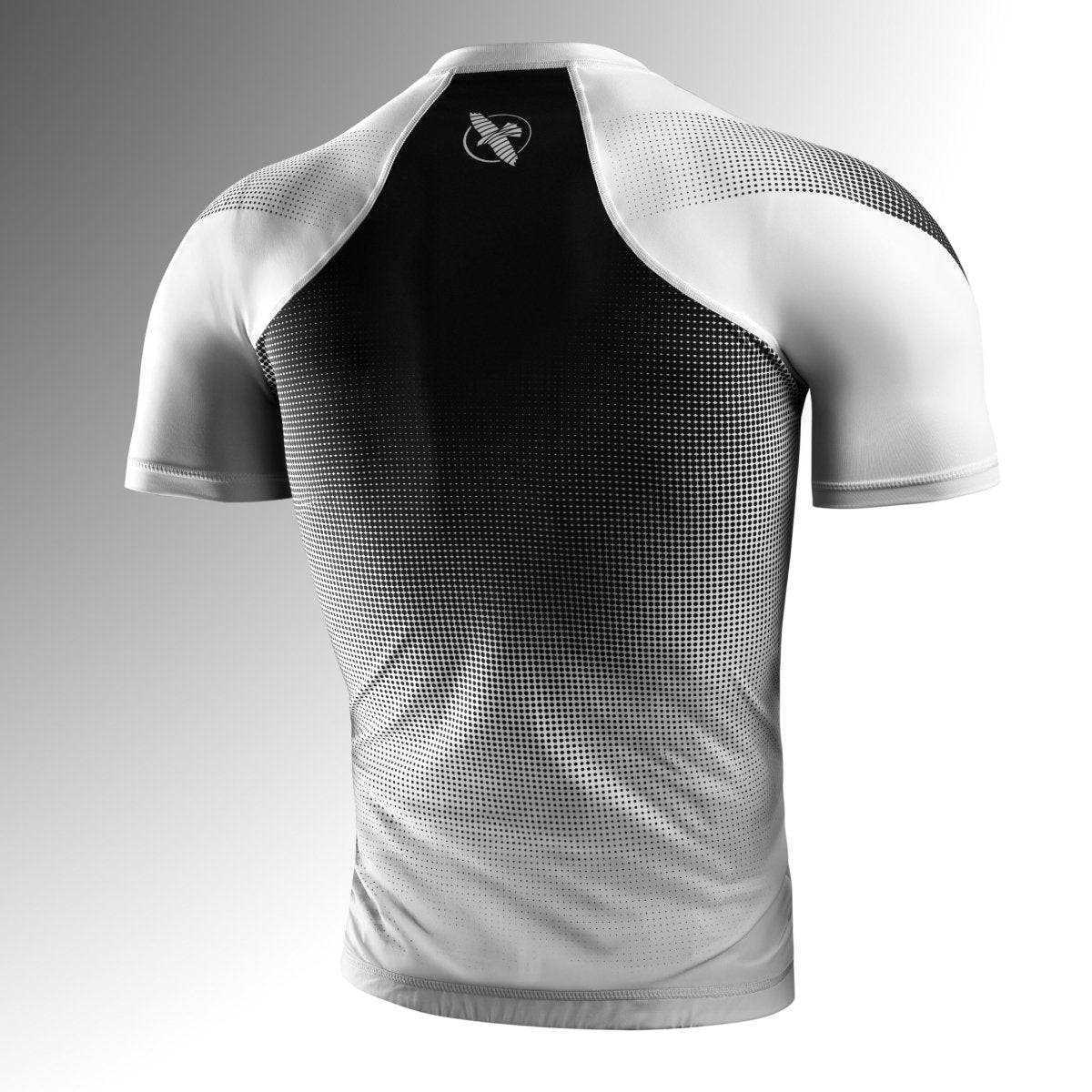 Rear view of the white Hayabusa Pro Ranked rashguard with short sleeves, ergonomic compression fit