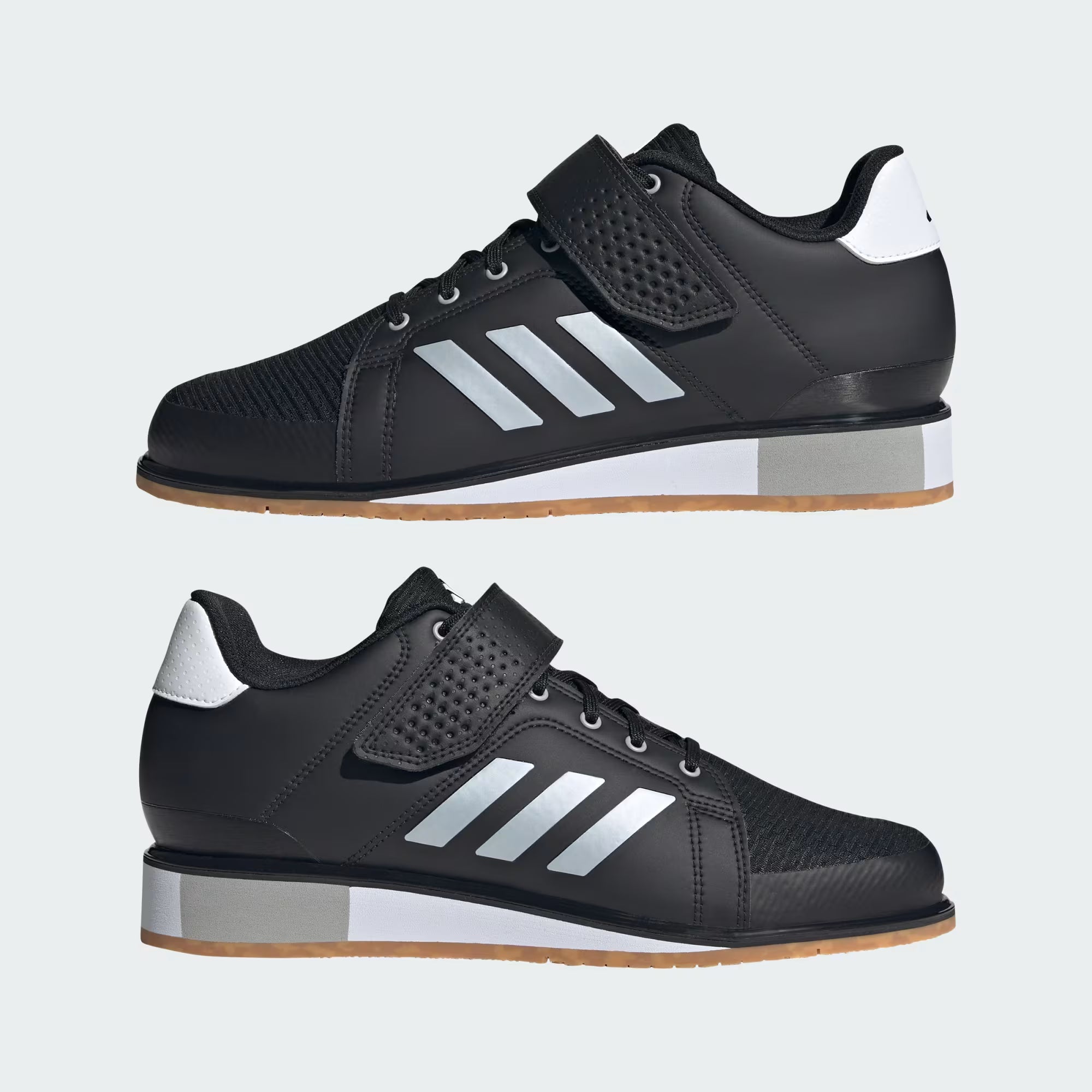Vista laterale delle scarpe Adidas APWR Perfect 3 che mostra la zeppa e la chiusura a strappo